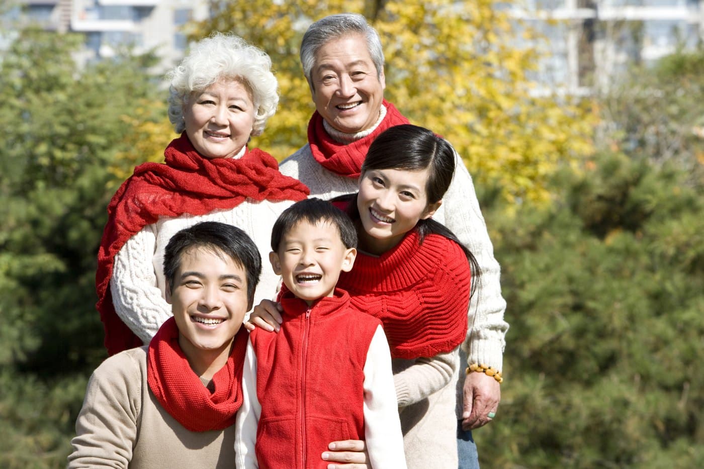A multi-generation Hawaii family together outdoors